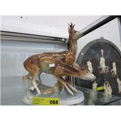 Vintage glazed porcelain statue of deer