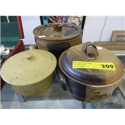 3 hand made pottery dishes with lids