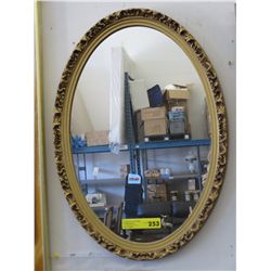 Framed oval wall mirror 18" x 26"