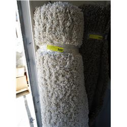 Cream shag area carpet