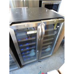 Glass front 2-door beverage fridge.