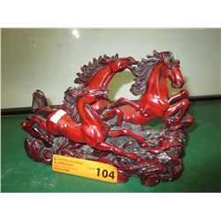 Galloping horses statue
