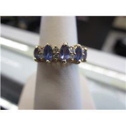 14KT yellow gold Tanzanite & Diamond ring. Gemologist appraised at $1600