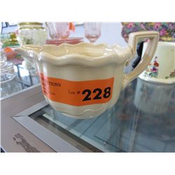 Royal Doulton handled sauce dish.