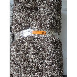 Multi colour shag carpet. Approx. 7' x 10'