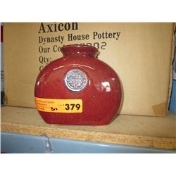 Case of glazed ceramic vases