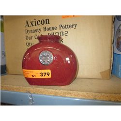 Case of glazed ceramic vases