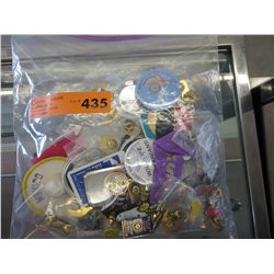 Bag of collectible pins, ribbons and buttons