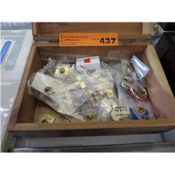 Vintage wooden box of collector pins