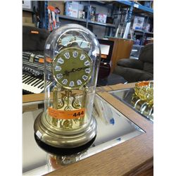 Brass dome clock by Kern