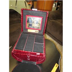 Travelling jewelry case with suitcase handle