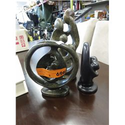 3 carved soapstone statues