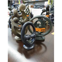 3 carved soapstone statues