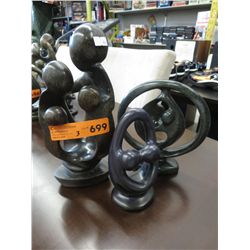 3 carved soapstone statues