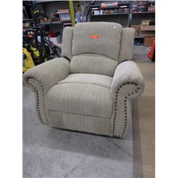 Upholstered recliner - used