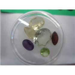 Six assorted cut multi-gemstone lot