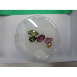 Gem jar of tourmaline gemstones in various colours