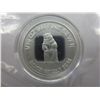 Image 1 : .999 Solid silver Grizzly Bear coin.