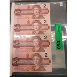 Uncirculated old Canadian two dollar bills