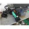 Image 1 : Hand held orbital sander and a grinder