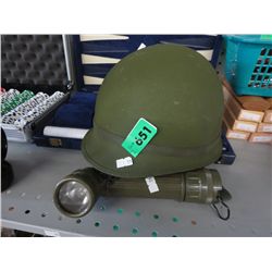 Vintage army helmet and light