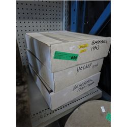 3 boxes of sports trading cards