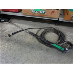 Spray wand and high pressure line.