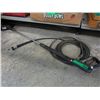 Image 1 : Spray wand and high pressure line.
