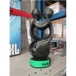 Carved soapstone statue