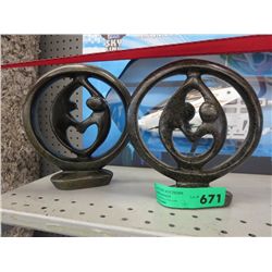 2 carved soapstone statues.