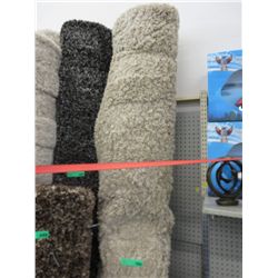 Beige shag carpet. Approx. 9' x 12