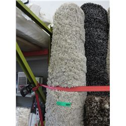 White shag carpet. Approx. 9' x 12