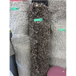 Brown shag carpet. Approx. 5' x 8'