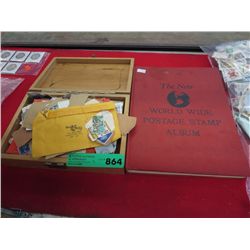 Box of assorted stamps & postage stamp album