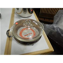 FIRE KING OVENWARE WITH LID AND ORIGINAL LABLE AND SILVER PLATE STAND