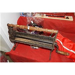 VINTAGE CAST IRON PAPER LOG ROLLER