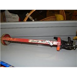 LARGE CAULKING GUN, PRY BAR AND SQUARE