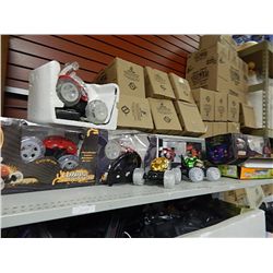 SHELF OF BOXES OF REMOTE CAR PARTS AND MORE
