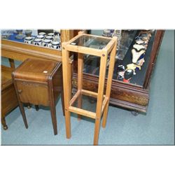 Single door waterfall end table and a glass and wood two tier stand