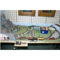 HO gauge train set up with track, mountains, trees etc.