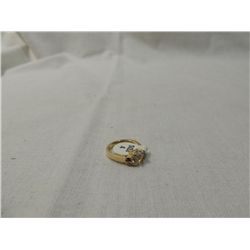 WOMANS GOLD TONE RING CZ