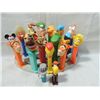 Image 1 : LOT 19 PEZ DISPENSERS: SIMPSONS, DISNEY, GARFIELD