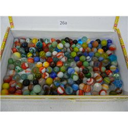 Marbles in a La Gloria Cubana Cigar Box