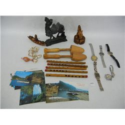 Souvenir Postcards, Wood Flutes, Handcarved Wooden Dog, Watches, and Camel Figurine