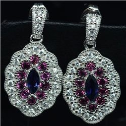 PAIR OF WHITE GOLD OVER STERLING EARRINGS W/ RHODOLITE