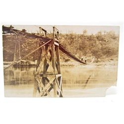 VINTAGE RPPC REAL PHOTO POSTCARD OF MEN WALKING A BRIDGE
