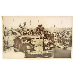 PHOTOGRAPH OF ADOLF HITLER RIDING IN A CAR BY A CROWD