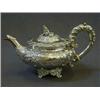 Image 1 : A BACHELOR TEAPOT, melon shaped, floral repousse, cast collet foot, cast finial, maker Samuel Hay