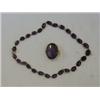 Image 1 : AN AMETHYST NECKLACE OF DEEP COLOUR, set in oval collets, with a matching larger brooch/pendant (