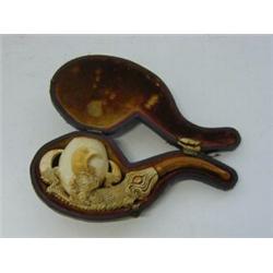 A CASED MEERSCHAUM TOBACCO PIPE, c.1900, grasping tallon length 13cm  30-50